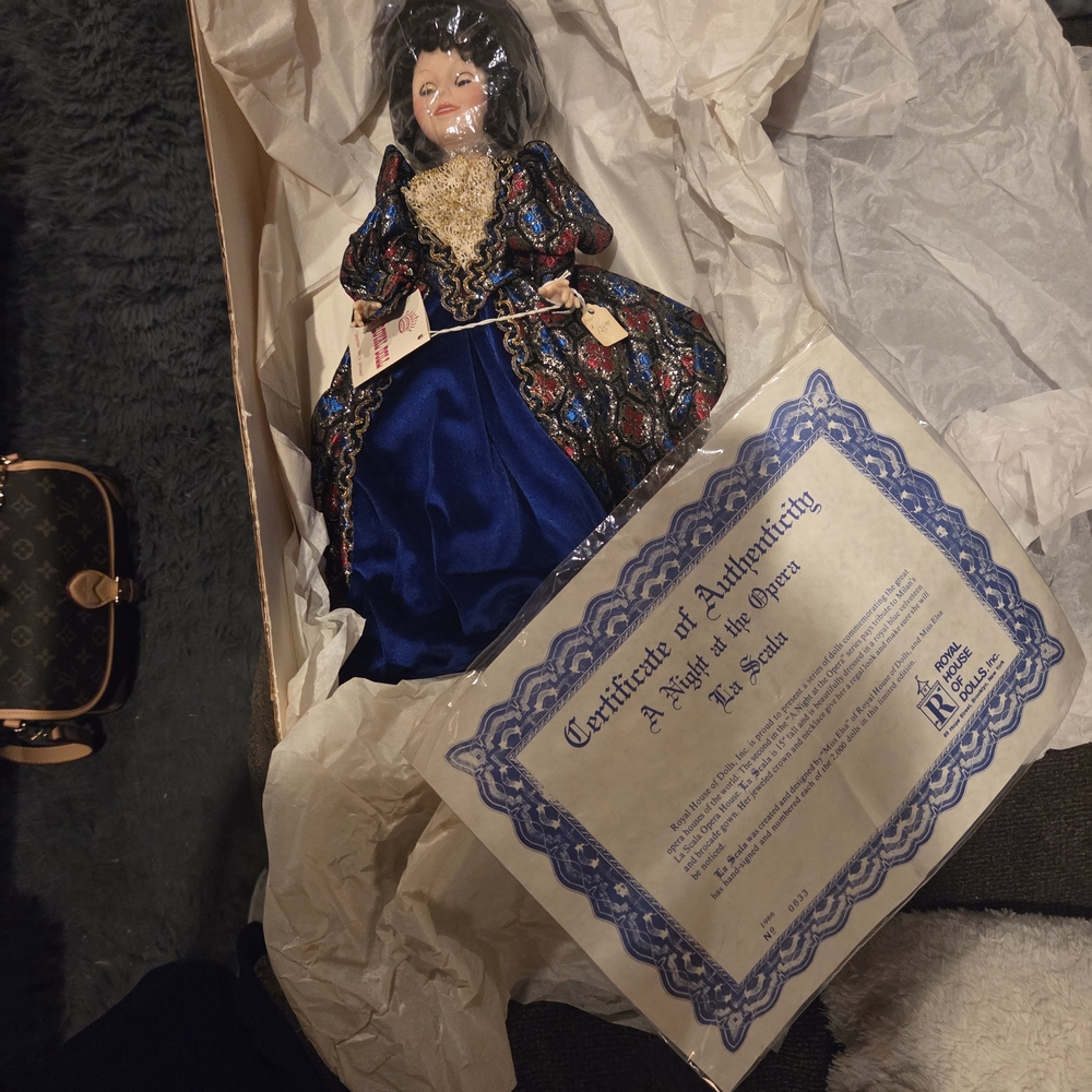 Porcelain Doll in Blue and Gold Attire